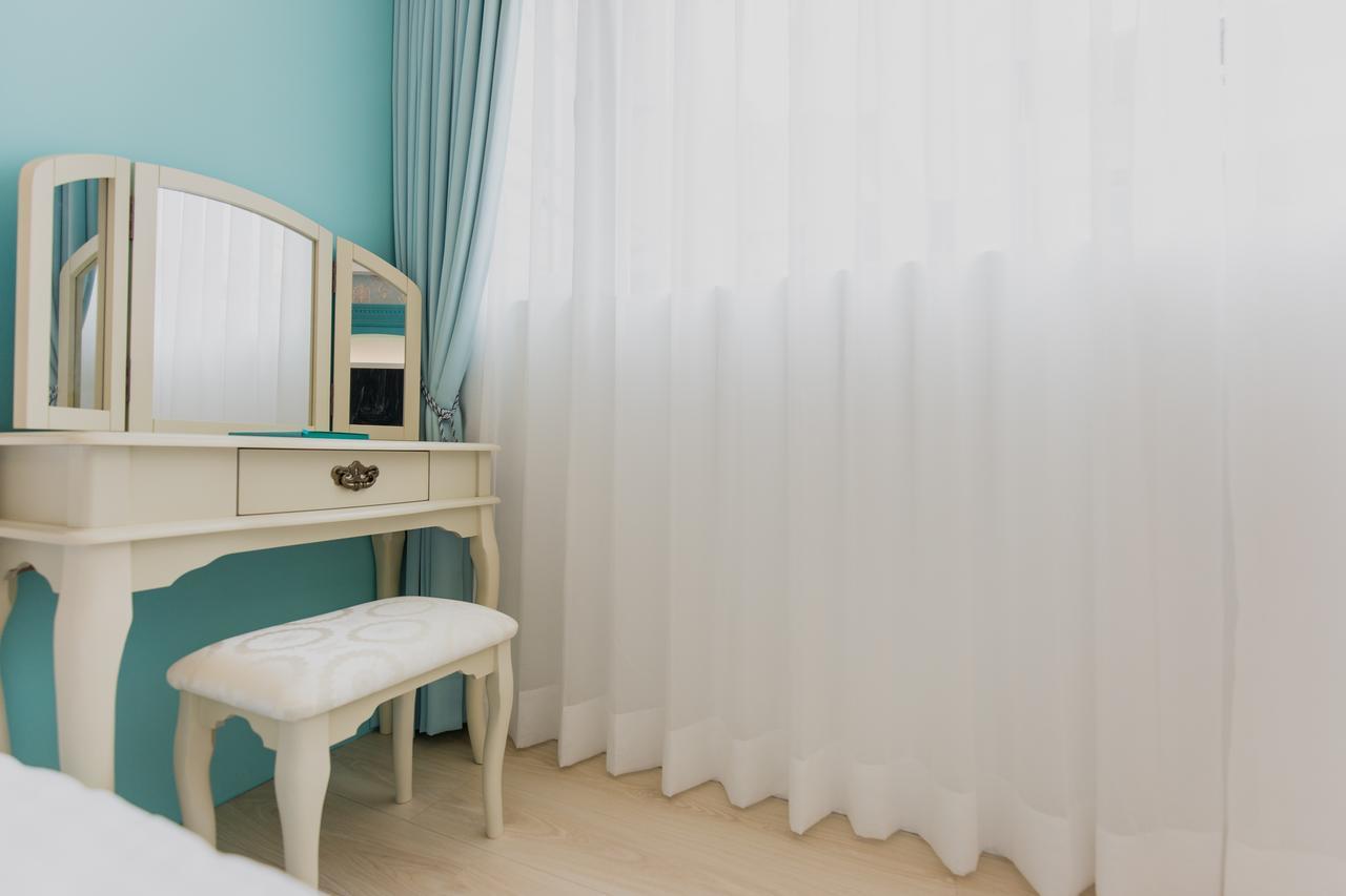 เวลคัม เดอะ ซัน เอนจอย เดอะ มูน Apartment เกาสง ภายนอก รูปภาพ