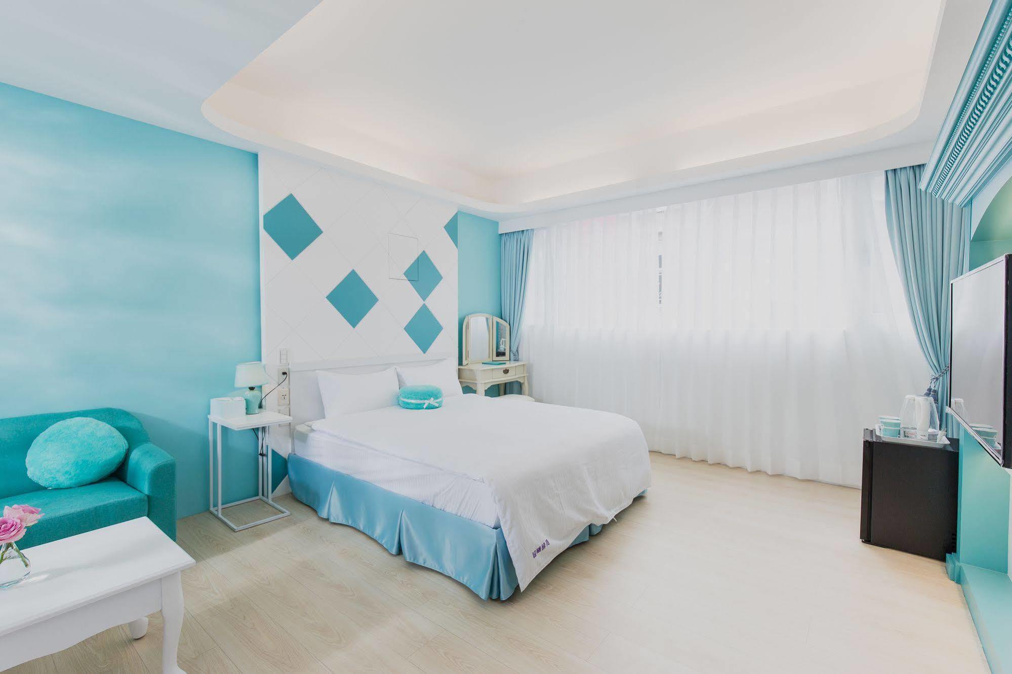 เวลคัม เดอะ ซัน เอนจอย เดอะ มูน Apartment เกาสง ภายนอก รูปภาพ
